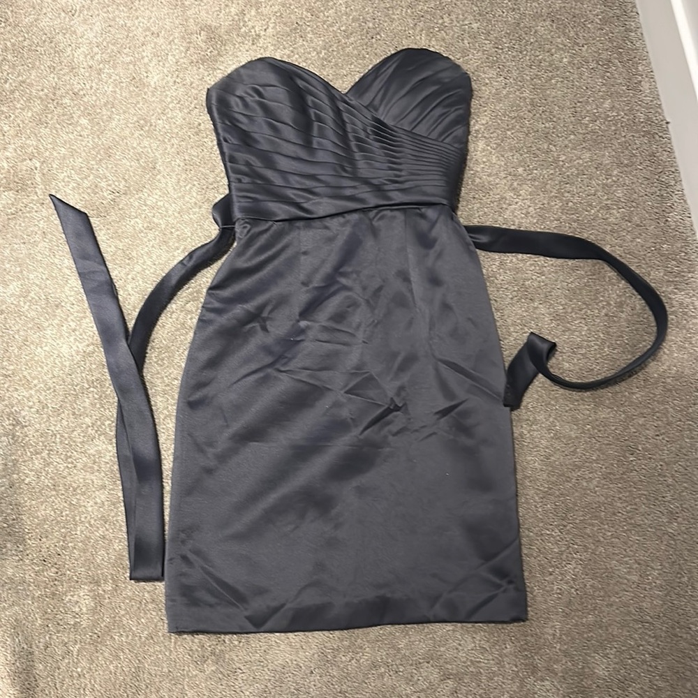 Grey strapless cocktail dress with sweetheart neckline.